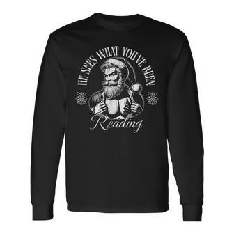 He Sees What You've Been Reading Christmas Santa Book Long Sleeve T-Shirt - Thegiftio UK