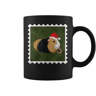 Cute Holiday Guinea Pig With Santa Hat And Candy Cane Coffee Mug | Mazezy