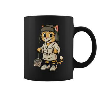 Cat Holding A Full Cup Of Coffee And Litter Box Scoop Coffee Mug - Monsterry
