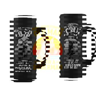 Never Underestimate An Old Man With a Doberman Owner Coffee Mug | Mazezy