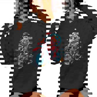 Santa Claus Riding Dirt Bike In a Fun Festive Holiday Ride Women's Hoodie | Mazezy