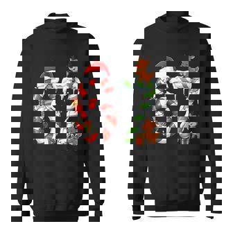 Christmas 67 Candy Cane Meme Six Seven Reindeer Lights Sweatshirt Unisex | Mazezy