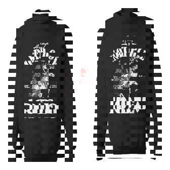 Cowboy Santa Riding Reindeer North Pole Rodeo Christmas Sweatshirt Unisex | Mazezy