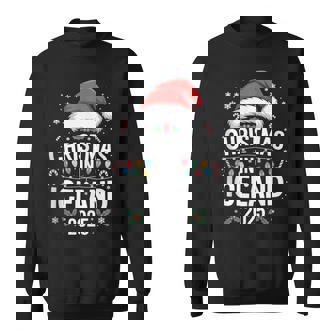 Holiday Season Fun Santa Hat Christmas In Iceland 2025 Tank Top Sweatshirt Unisex | Mazezy