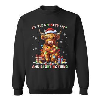 On The Naughty List And Reget Nothing Christmas Highland Cow Sweatshirt - Thegiftio UK