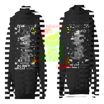 On The Naughty List And I Regret Nothing Chirstmas Sweatshirt | Mazezy