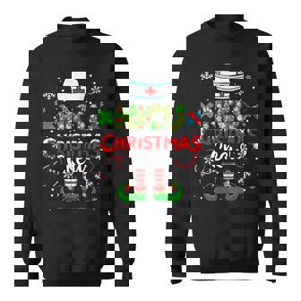 NICU Christmas Crew Colorful Floral Costume Elf Nurse Job Sweatshirt Unisex | Mazezy