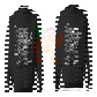 Santa Bigfoot Christmas Tree Xmas Lights Sasquatch Rock Hand Sweatshirt | Seseable CA