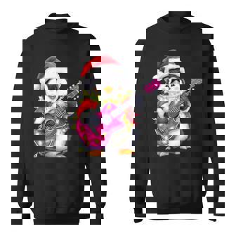 Santa Penguin Playing Pink Guitar Christmas Holiday Sweatshirt | Mazezy