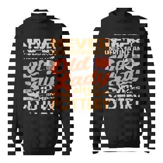 Never Underestimate Old Lady Who Makes Pottery Sweatshirt Unisex | Mazezy