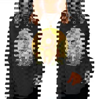 花畑に大きな目を持つかわいいポニー レディーススウェットシャツ - Kawaiitshirt