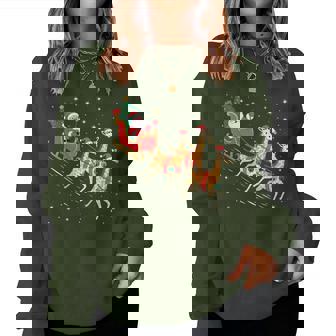 Santa Giraffe Sleigh Flying Christmas Night Women Sweatshirt - Monsterry