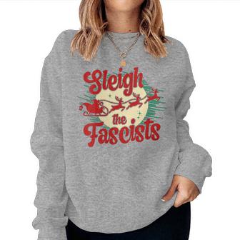Sleigh The Fascists Political Christmas Human Rights Women Sweatshirt | Mazezy