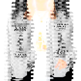 Never Underestimate A Woman Who Still Travels In Her 80'S Women Sweatshirt - Seseable