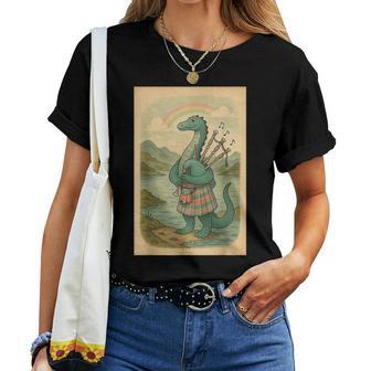 Nessie Playing Bagpipes Under A Rainbow In Scotland Women T-shirt - Thegiftio