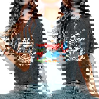 Christmas A Penguin Reading Book Snowflake Cocoa Hot Teacher Women's Oversized Comfort T-Shirt - Thegiftio