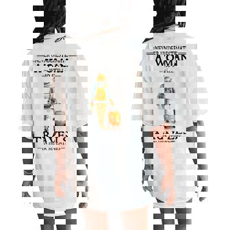 Never Underestimate A Woman Who Still Travels In Her Women's Oversized Comfort T-Shirt Back Print | Mazezy