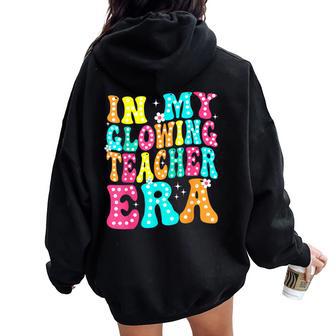 In My Glowing Teacher Era Groovy Colorful Bright Women Oversized Hoodie Back Print - Seseable