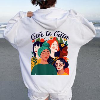 Give To Gain International Women's Day 2026 Flowers Women Women Oversized Hoodie Back Print - Thegiftio UK