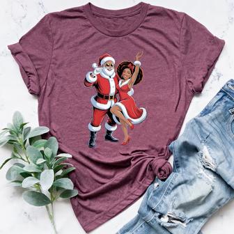 African American Christmas Pajamas Dancing Santa Women's Heather T-Shirt | Mazezy
