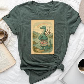 Nessie Playing Bagpipes Under A Rainbow In Scotland Bella Canvas T-shirt - Thegiftio