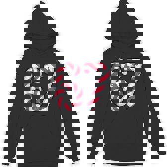 Festive 67 Candy Canes Christmas Six Seven Meme Hoodie - Monsterry