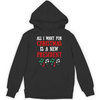 All I Want For Christmas Is A New President Xmas Joke Hoodie | Mazezy