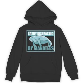 マナティーに気を取られる かわいいマナティー 面白い 海の動物 パーカー - Kawaiitshirt