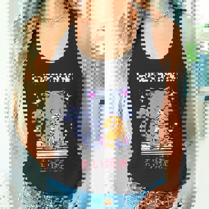 たい焼きが大好き かわいい かわいい 猫がたい焼きを食べる 日本アニメ タンクトップ