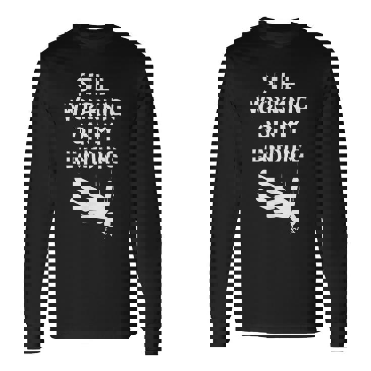 まだ着地作業中！おかしい頭部骨折の回復作業中 長袖Tシャツ