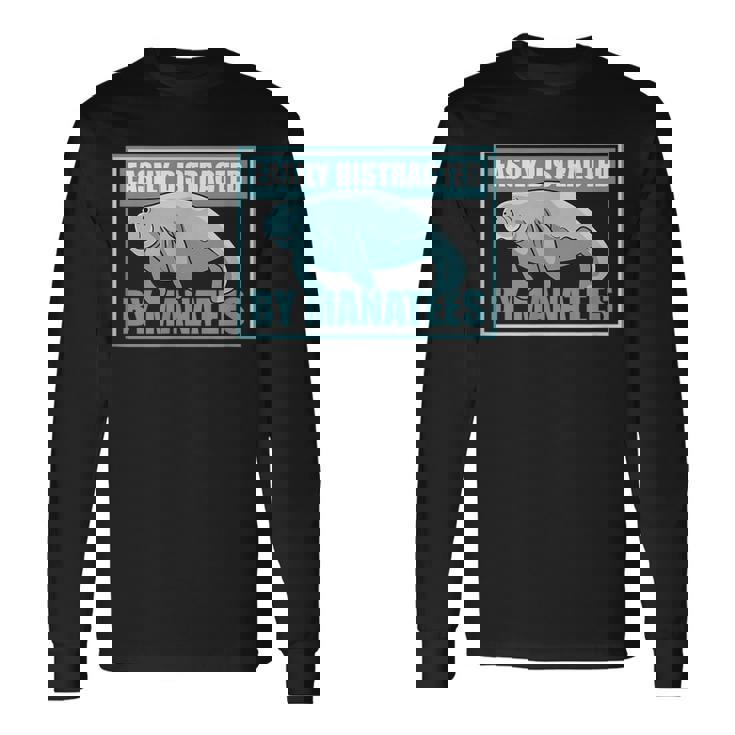 マナティーに気を取られる かわいいマナティー 面白い 海の動物 長袖Tシャツ