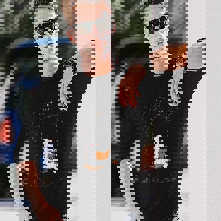 ハロウィン おばけ 読書 かわいい マジカル 本 恋人 本の虫 長袖Tシャツ 彼への贈り物