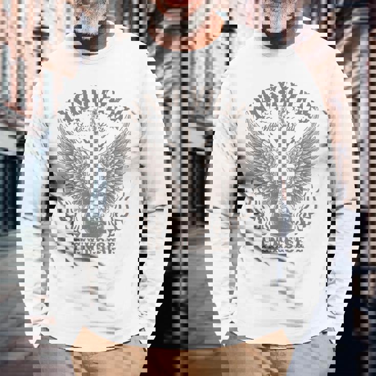 ナッシュビル テネシー ギター カントリーミュージック シティ レディース メンズ キッズ 長袖Tシャツ 高齢者への贈り物