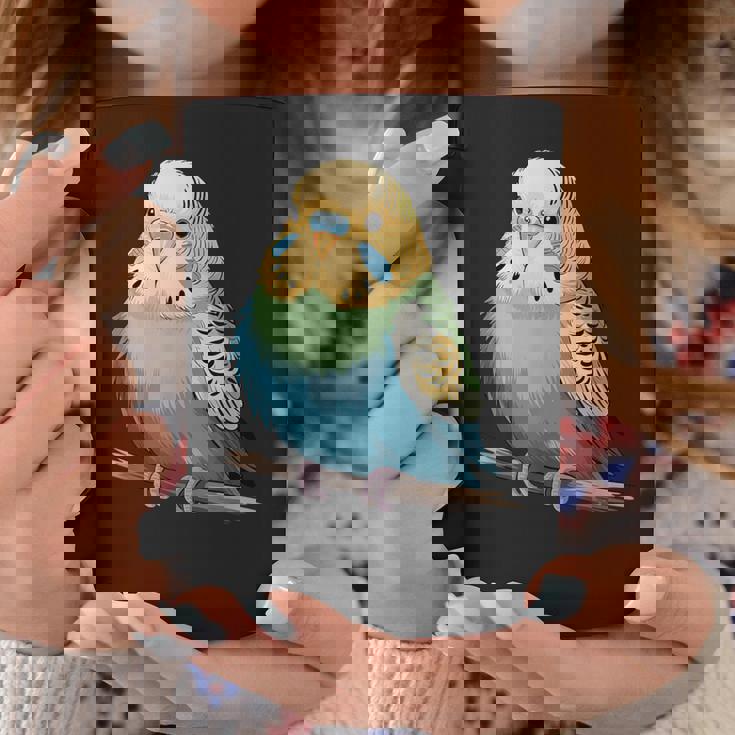 枝に腰掛けたチャーミングなセキセイインコ コーヒーマグ 面白い贈り物