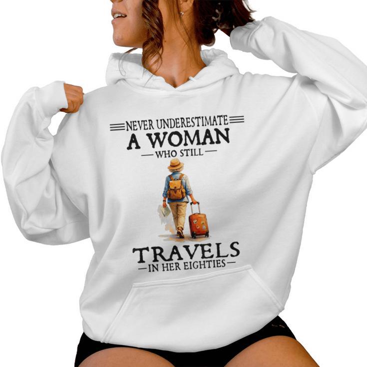 Never Underestimate A Woman Who Still Travels In Her 80'S Women Hoodie