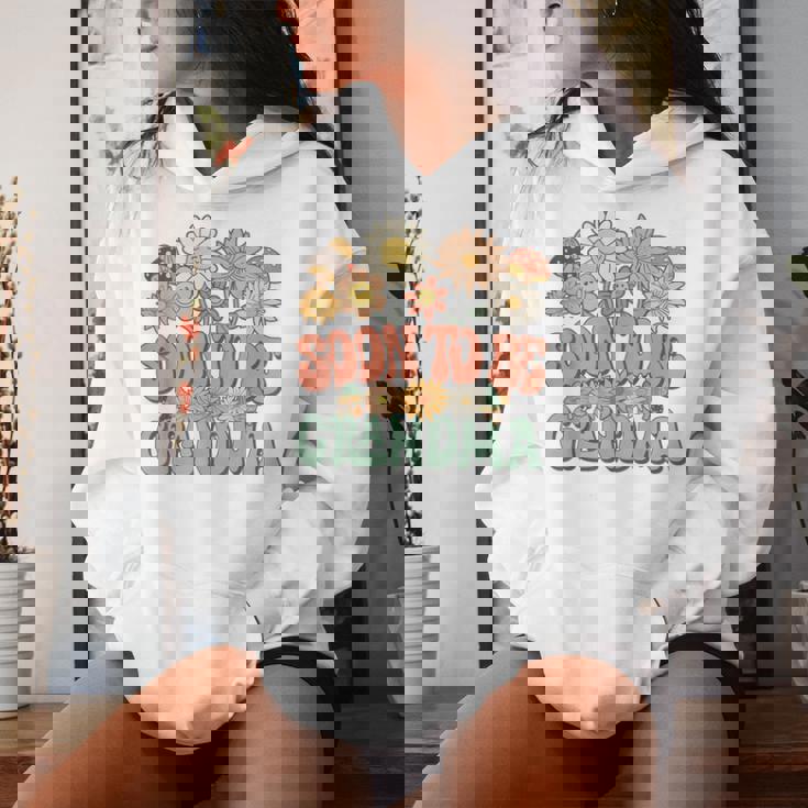 Soon To Be Grandma Expecting Baby Daisy Groovy Wildflower レディースパーカー 彼女への贈り物