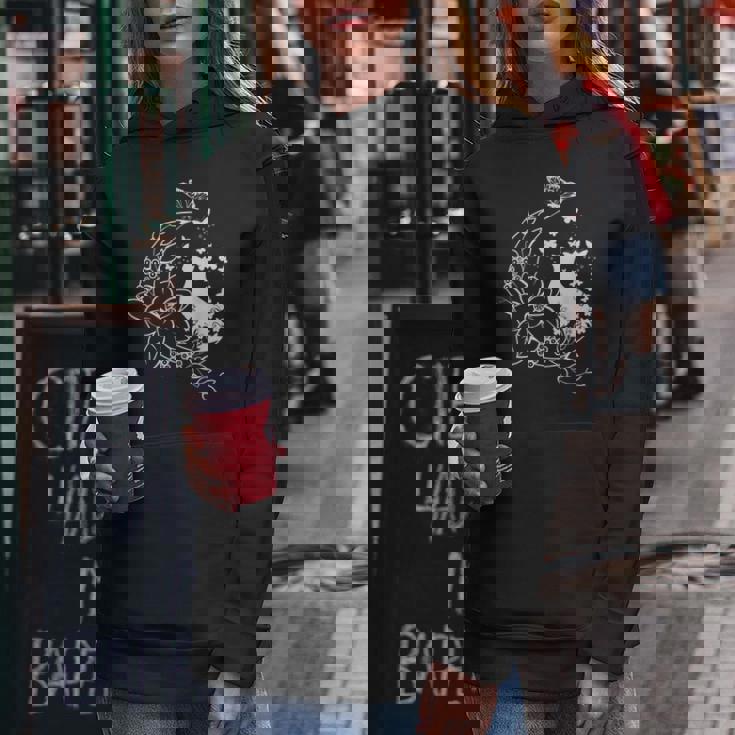 花柄の三日月と蝶を持った猫。 レディースパーカー 面白い贈り物