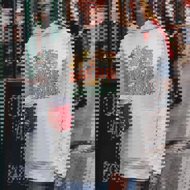 Soon To Be Grandma Expecting Baby Daisy Groovy Wildflower レディースパーカー 面白い贈り物