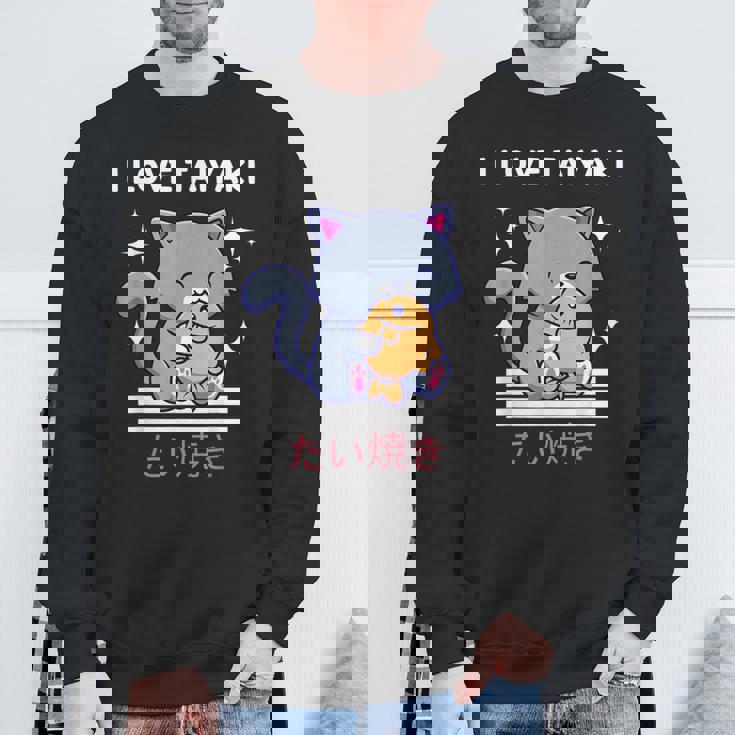 たい焼きが大好き かわいい かわいい 猫がたい焼きを食べる 日本アニメ スウェットシャツ 高齢者への贈り物