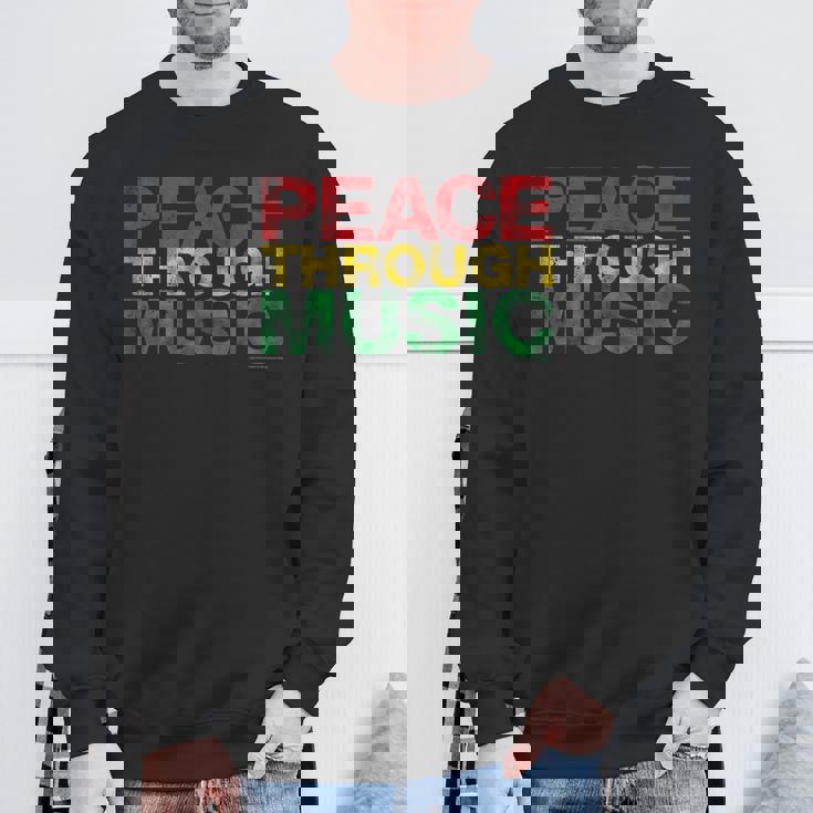 音楽を通して平和を変えるために遊ぶ スウェットシャツ 高齢者への贈り物
