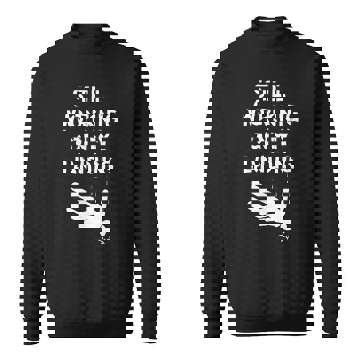 まだ着地作業中！おかしい頭部骨折の回復作業中 スウェットシャツ