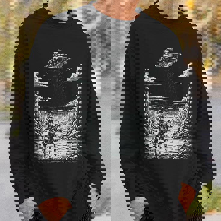 Lone Cowboy Watching Ufo 空飛ぶ円盤 キャニオン スウェットシャツ 彼への贈り物