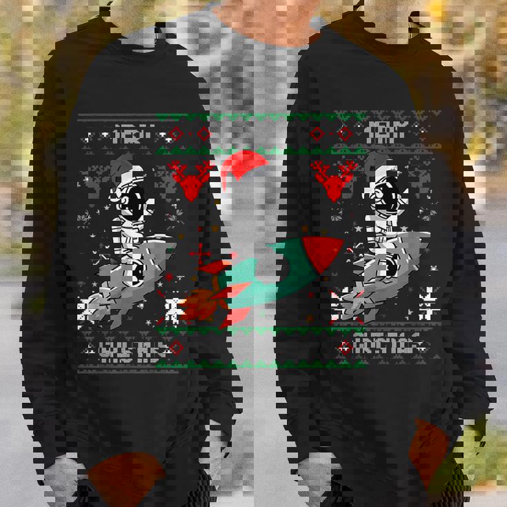 Ugly Christmas Astronaut Riding Rocket Santa Hat Tree Sweatshirt Gifts for Him