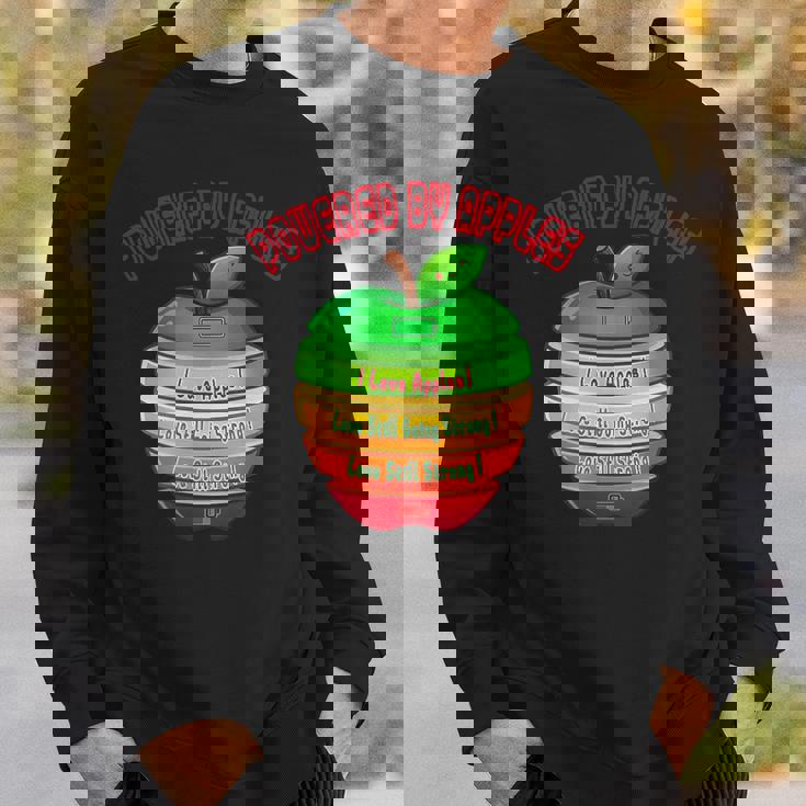 「Powered By Apples（リンゴの力）」リンゴ スライス 充電 バッテリー 残量 おもしろみ 可愛い スウェットシャツ 彼への贈り物