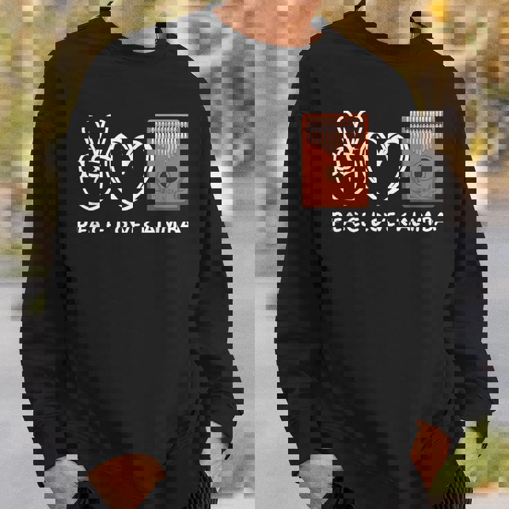 ピース、ラブカリンバレトロカリンバラバー スウェットシャツ 彼への贈り物