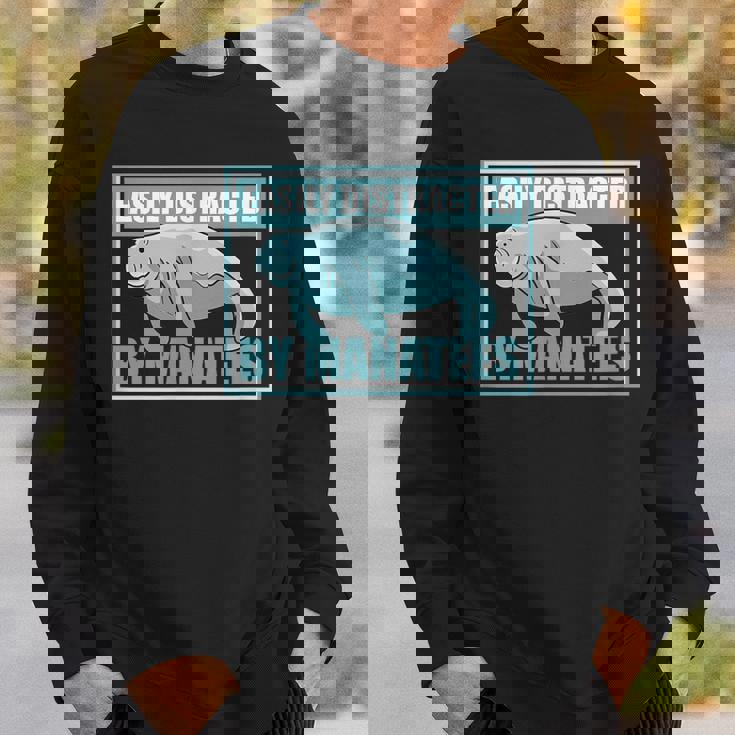 マナティーに気を取られる かわいいマナティー 面白い 海の動物 スウェットシャツ 彼への贈り物