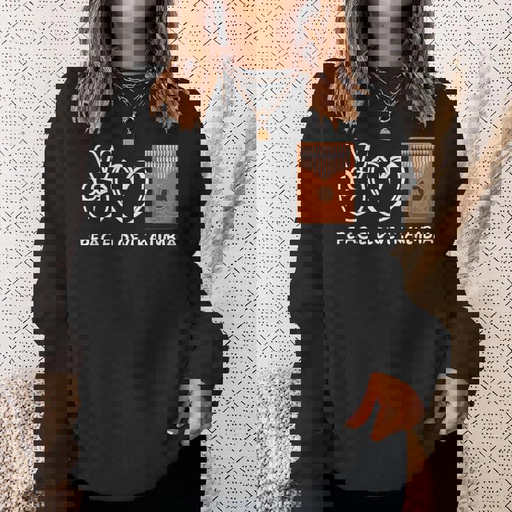 ピース、ラブカリンバレトロカリンバラバー スウェットシャツ 彼女への贈り物