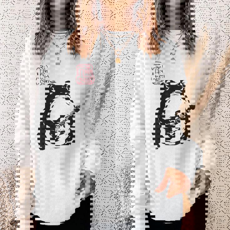 不機嫌そうなカエル 面白い ギター ロックミュージック アニメ 日本語 スウェットシャツ 彼女への贈り物