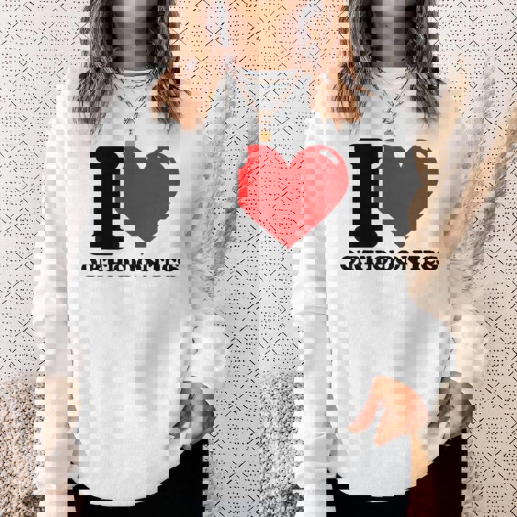 私は歯科矯正が大好きです スウェットシャツ 彼女への贈り物