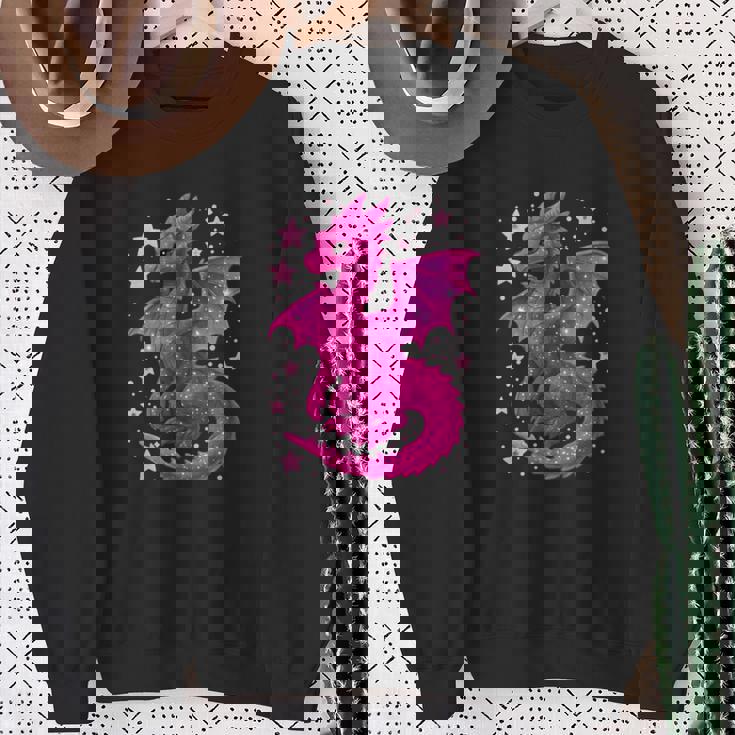 ピンクファンタジー ドラゴンと星 長袖tシャツ スウェットシャツ 年配の女性への贈り物